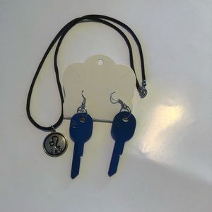 Leo necklace and blue key earrings